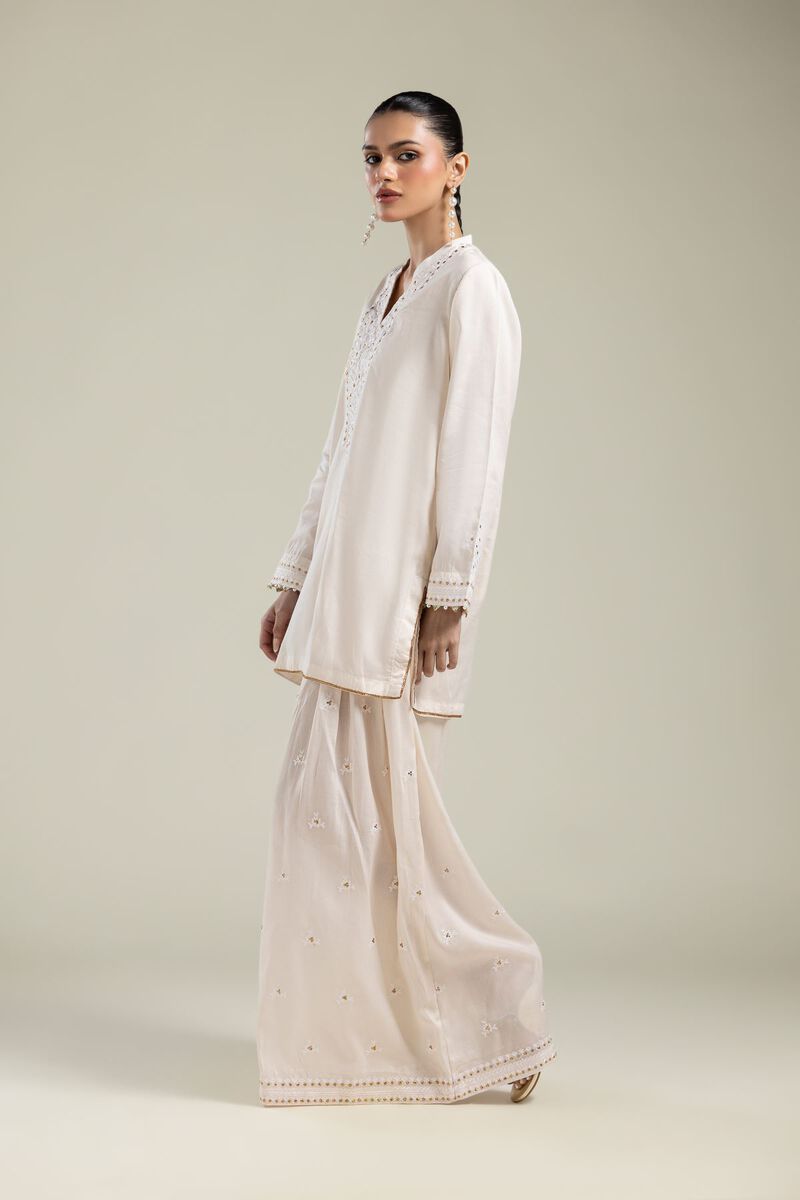 Embroidered | Textured Weave | White Solid Pants | USD 40.00