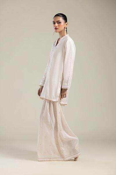 Embroidered | Textured Weave | White Solid Pants | USD 40.00