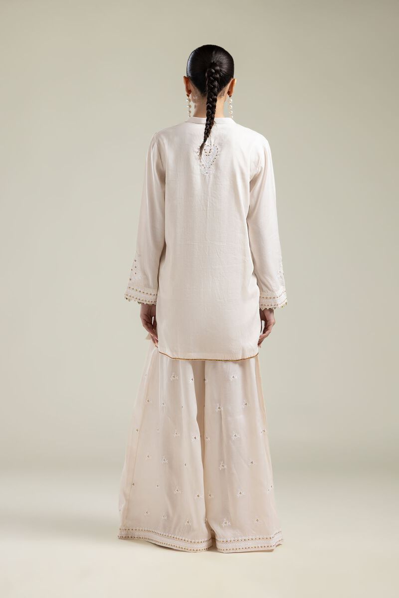 Embroidered | Textured Weave | Short V-Neck Kurta | USD 40.00