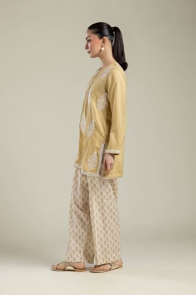 Embroidered | Textured Weave | Beige Printed Pants | USD 30.00