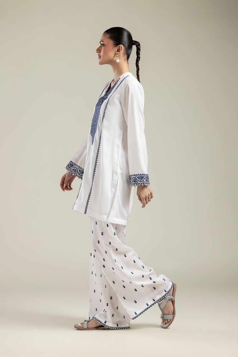 Embroidered | Textured Weave | Geometric White Pants | USD 30.00