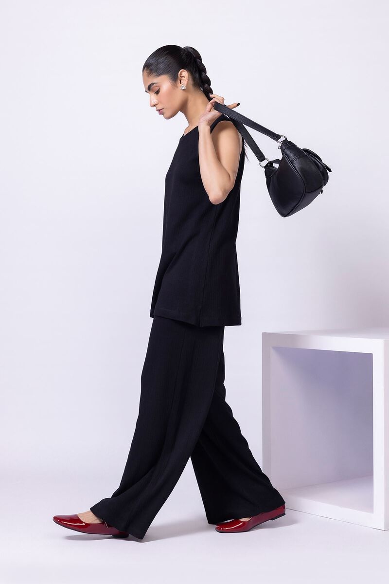 https://us.khaadi.com/dw/image/v2/BJTG_PRD/on/demandware.static/-/Sites-khaadi-master-catalog/default/dwce1c1329/images/hi-res/wcbx24106_black_1.jpg?sw=800&sh=1200